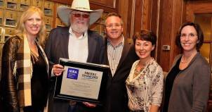 Following the ceremony, a proud Charlie Daniels poses with friends (left to right): Beverly Keel, MTSU's new chair of the Department of Recording Industry; Daniels; Pete Fisher, Grand Ole Opry general manager; Pam Matthews, executive director of the International Entertainment Buyers Association; and Melissa Wald, Recording Industry associate professor. Photo by Vicky Tubb