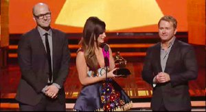 Singer Kacey Musgraves, center, holds the 2014 GRAMMY Award for Best Country Album during the televised event as the album's co-producers, MTSU alumnus Luke Laird, left, and Shane McAnally, look on. (Photo courtesy of GRAMMY.com)