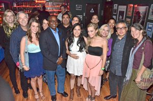 MTSU President Sidney A. McPhee poses with members of Maybe April, a singing trio that includes MTSU students Kristen Castro (right of McPhee) and Katy Bishop (right of Castro). The group also includes Nashville resident Alaina Stacey (left of McPhee). Mass Communication Dean Ken Paulson (second from far left) and Recording Industry Chair Beverly Keel (far left) hosted the MTSU alumni and industry event Jan 25 at the Troubadour club in West Hollywood.