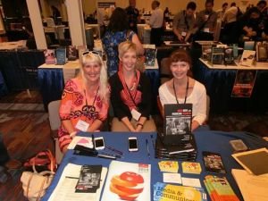 Journalism Professor Jane Marcellus (right) with two of her co-authors, Kimberly Wilmot Voss (left) and Tracy Lucht at a book signing.