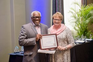 Dwight Brooks, School of Journalism Director, left, and Sharon Fitzgerald, Ed Kimbrell Excellence in Teaching Award recipient.